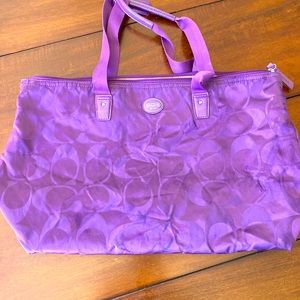 Coach weekender bag with attached makeup bag